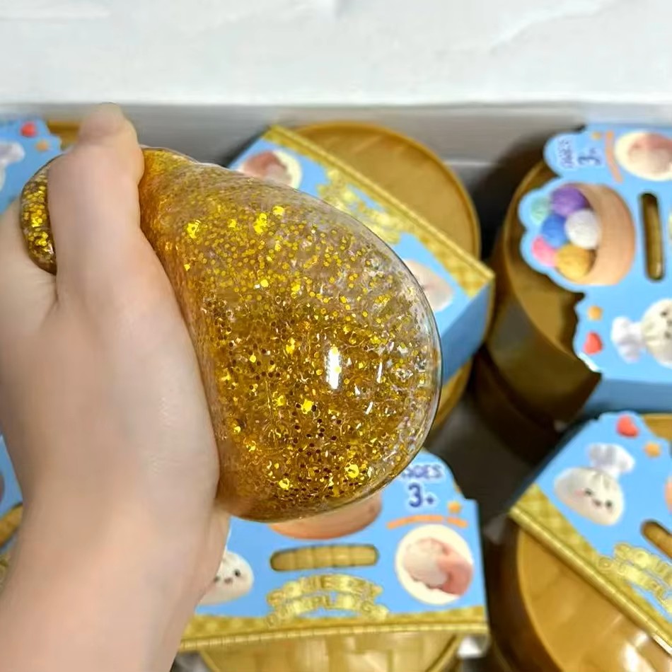 لعبة فيدجيت على شكل زلابية مضغ - مراجعة Kids Toys Dumplings وسعره