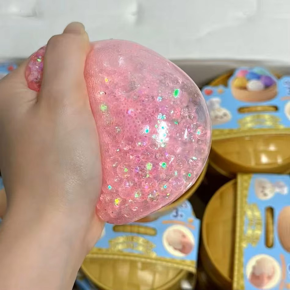 لعبة فيدجيت على شكل زلابية مضغ - مراجعة Kids Toys Dumplings وسعره